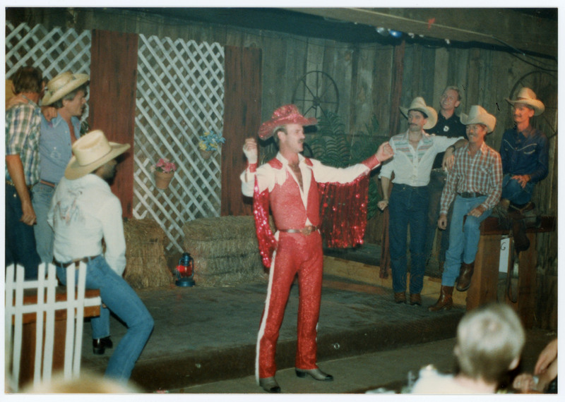 Man in red cowboy outfit
