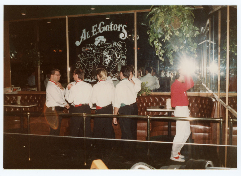 Group of men at bar