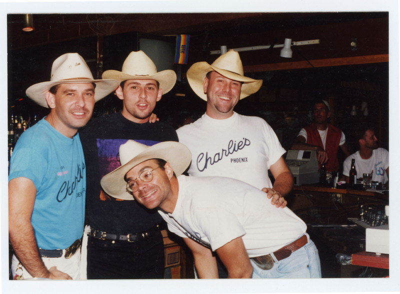 Four men wearing cowboy hats
